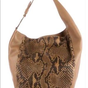 Gucci Hobo bag with pebbled calf leather and python skin. Gently worn.